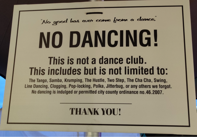 A sign at Galway's Nimmo's Pier venue where a Jape show took place. The sign says NO DANCING!